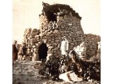 During the vintage the Arab farmer repairs with his family to one of the crude stone watchtowers. From the upper storey of the tower a look-out is constantly maintained - the sleeping quarters are in the lower part.